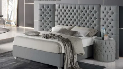 Letto in pelle con testiera trapuntata Puccini di Stilfar Italia