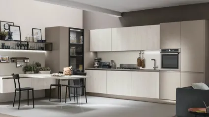 Cucina Moderna con penisola Infinity v12 in Termo Strutturato Larice Bianco e Cemento Visone di Stosa